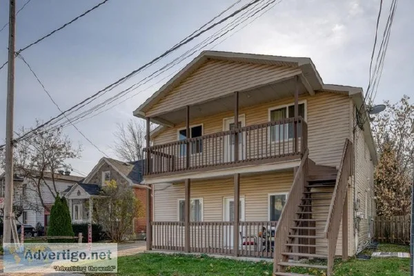 Large 4plex with double garage 5 min from commuter train Ste-The