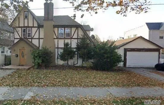 ID  (ELA) Lovely Tudor Style Stucco Home on Oversized Lot