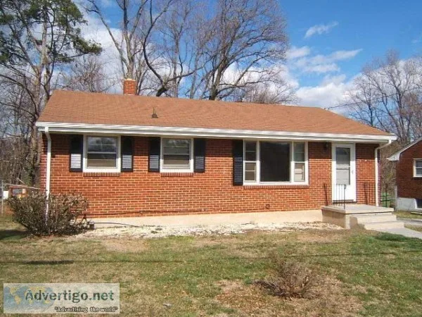 Property features an eat-in-kitchen with range