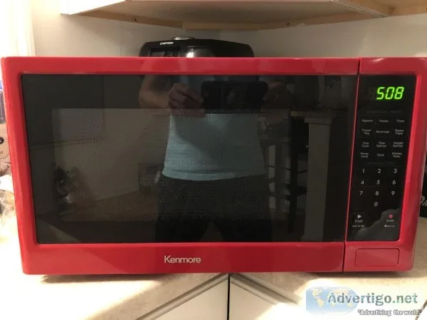 Like new Kenmore 1.1 Cu. Ft. 1100 watts Red Microwave