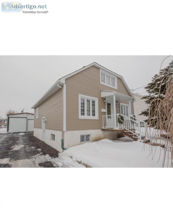 Rare  House for sale with oversized garage Laval-des-Rapides