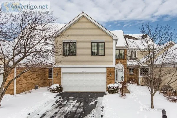 FABULOUS TWO STORY CONTEMPORARY TOWNHOME IN DESIRABLE RIVA RIDGE