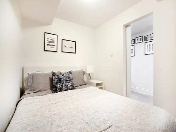 On A Tree Lined Street In Mimico. A Charming 1.5 Storey Family H
