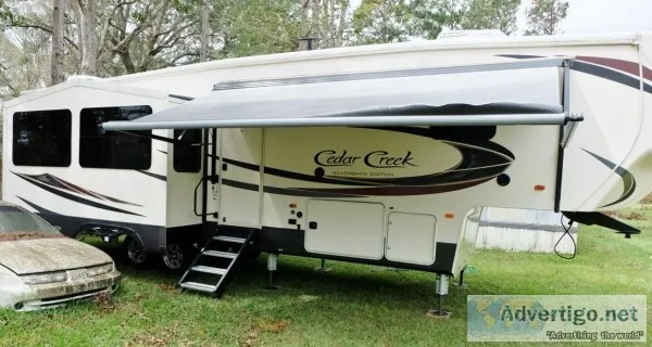 Like new 2019 37 ft. Forest River Cedar Creek Silverback 33Ik