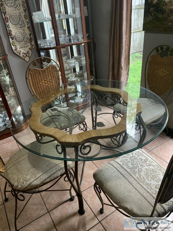 Round glass table with 4 chairs