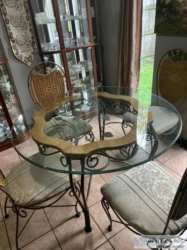 Round glass table with 4 chairs