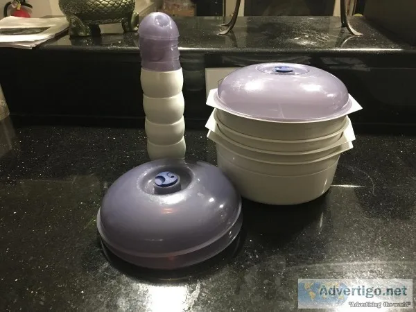 Containers with lids set up 12 by stream There New