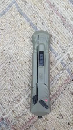 MandP Stiletto pocket knife blade slides out the front automatic