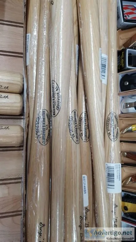 18 inch Louisville Slugger Babe Ruth made of wood with a pocket 