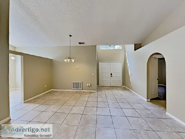 The interior features stylish tile flooring for a low-maintenanc