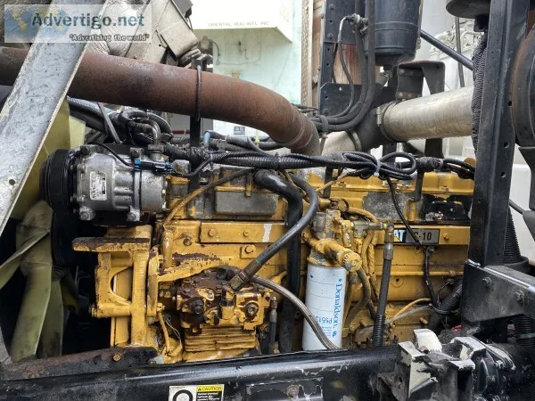2005 peterbilt 320 leach rear loader garbage truck