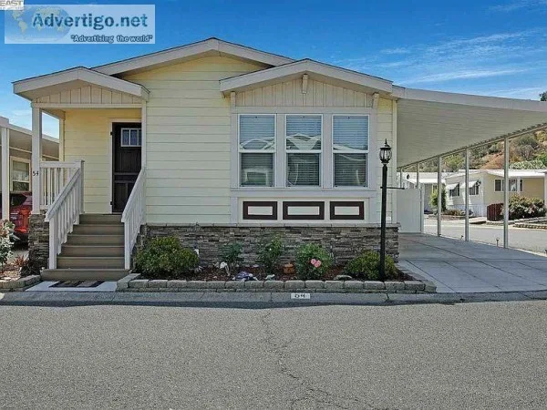 Gorgeous Clayton Palms home is situated on corner lot featuring 
