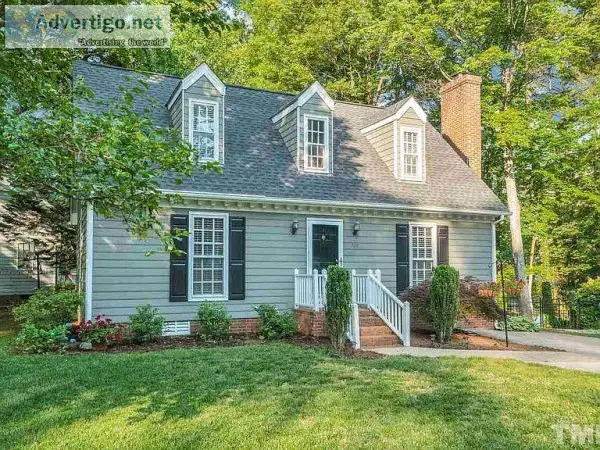 Adorable cap cod on beautifully landscaped lot in sought after B