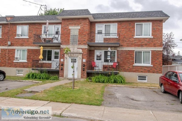 Brick quadruplex Same owner for 40 years  Laval-des-Rapides