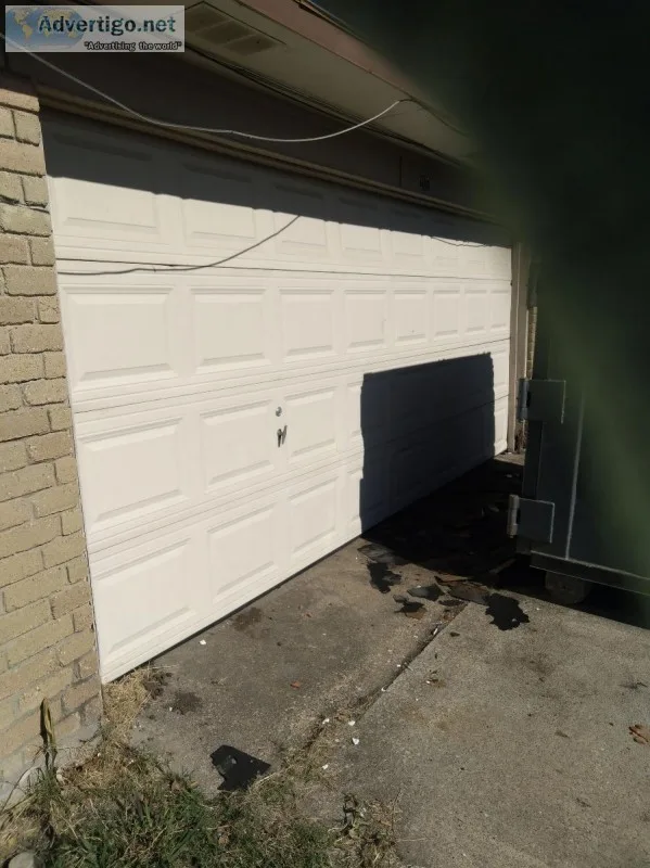 Experienced garage door technician repairs installs highest qual