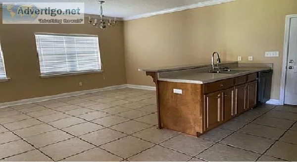 This lovely home is located in Devon Village.