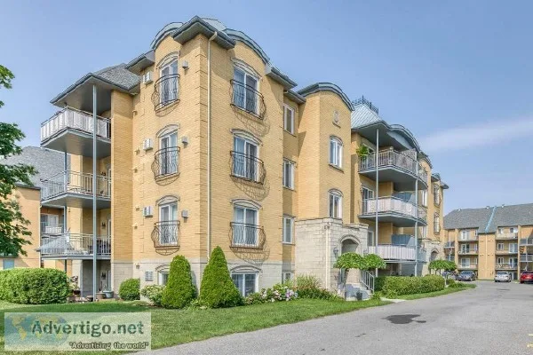 Superb open concept condo sought after area of Brossard