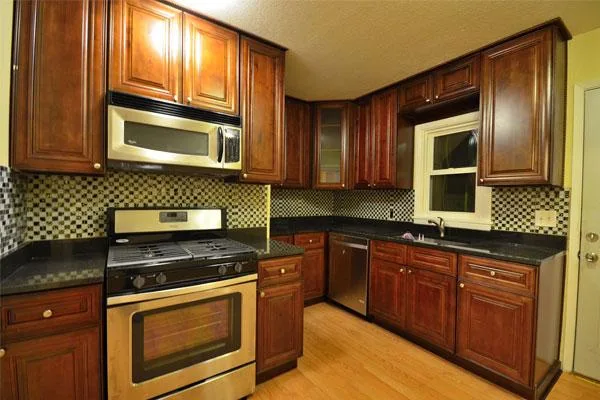 Switch to a vibrant kitchen with glazed maple cabinets