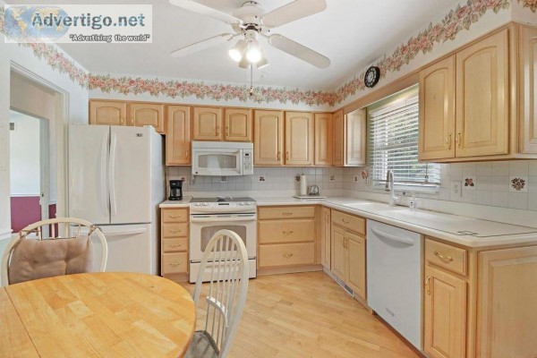 Bleached Oak Kitchen Cabinets All Appliances and Corian Counter 