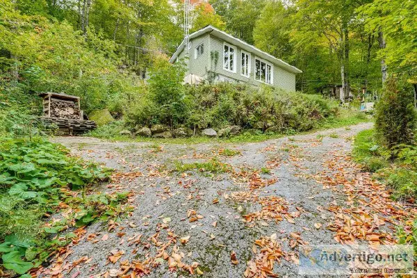 House or chalet with access to navigable lake in St-Sauveur 1740