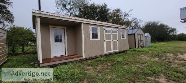Cabin with a corner porch storage building 12x28