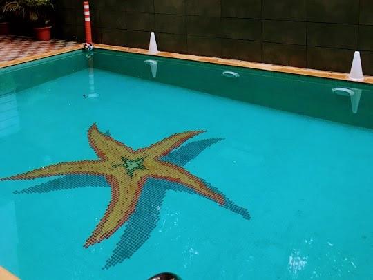Glass mosaic murals for swimming pools