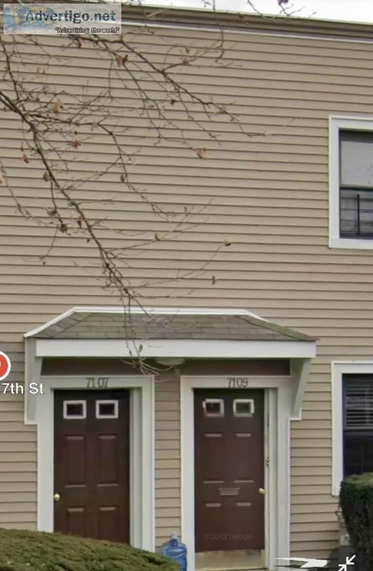 REMARKABLE TWO BEDROOM APARTMENT WITH BACK YARD