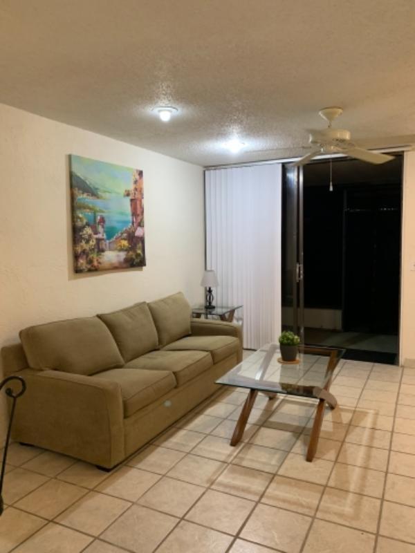 open kitchen with dishwasher and microwave  screened patio with 