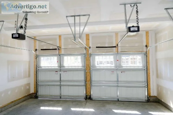 GARAGE DOOR BROKEN SPRING REPAIR WAYNE