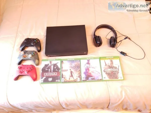 BARELY USED XBOX ONE X COMBO like brand new no scratches