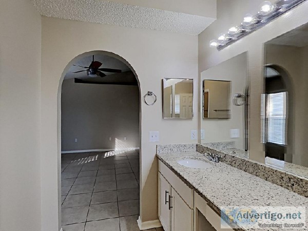 The interior features stylish tile flooring throughout
