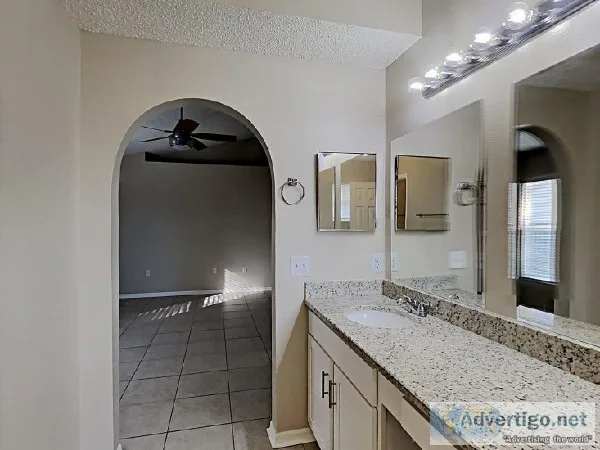 The interior features stylish tile flooring throughout