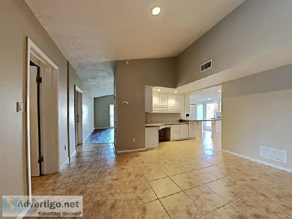 Cozy bedrooms a stone fireplace and a kitchen equipped with a br