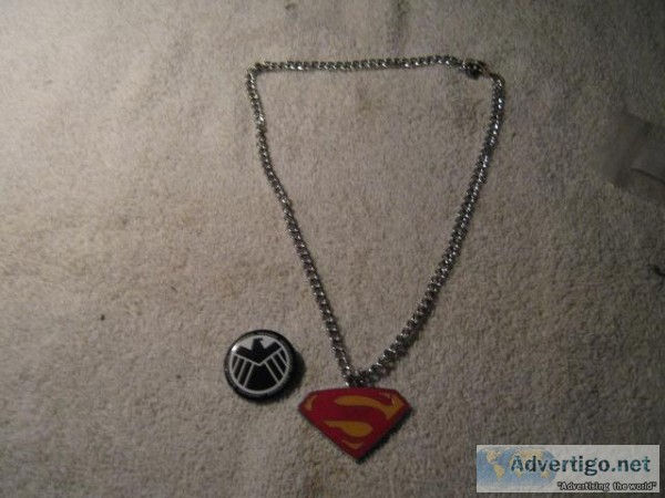 Superman Medallion on a 14 inch chain with some sort of Medallio