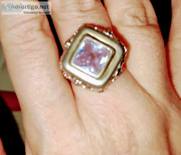A women s diamond shape stone purple Ruby ring