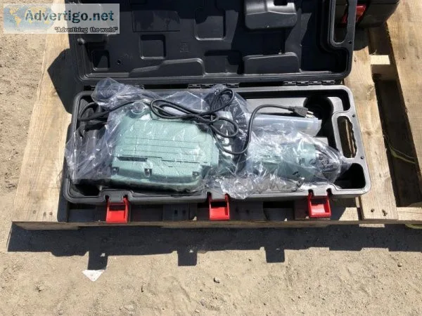 (2) UNUSED HUSKIE B65 DEMOLITION HAMMER