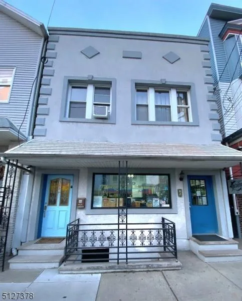 Come see this multi-family home with a business studio in the he
