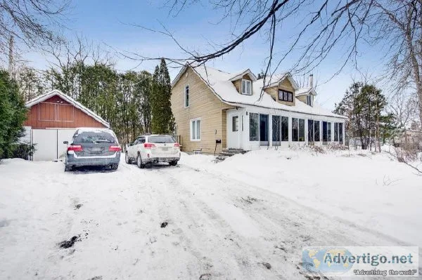 Maison &agrave L &Icircle-Bizard avec acc&egraves au lac des Deu