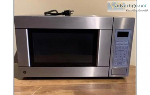 Moving Sale Pre owned GE MWave oven 1100 Watts JES1142