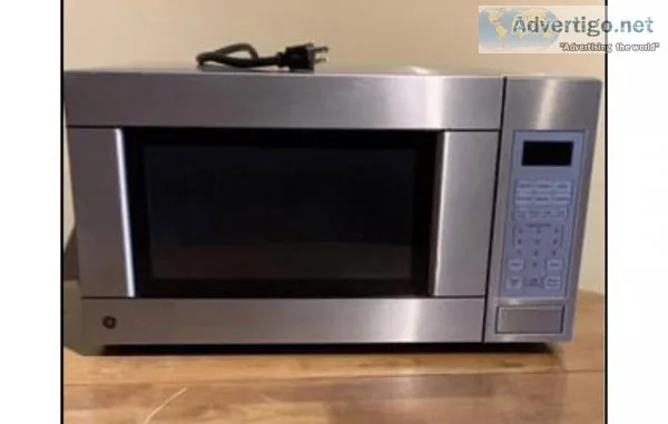 Moving Sale Pre owned GE MWave oven 1100 Watts JES1142