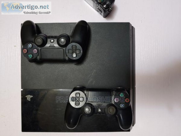 NEATLY USED PS4 WITH TWO WORKING GAME PADS