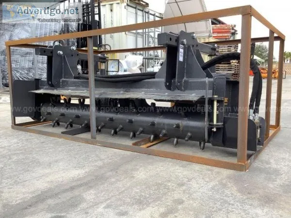 UNUSED LANDHONOR POWER RAKE ATTACHMENT FOR UNIVERSAL SKID STEER