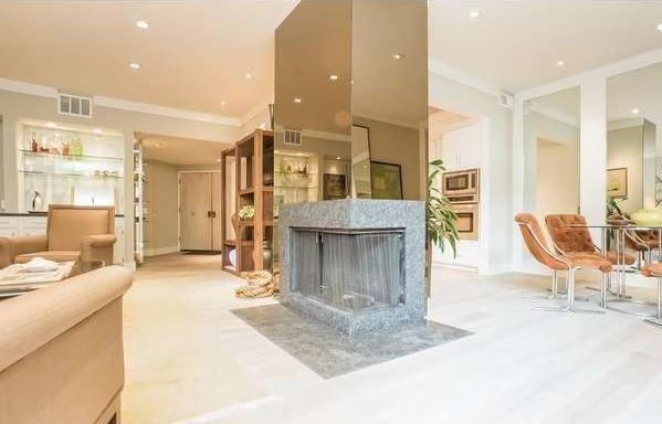 This Perfectly Located Designer-Styled 930 N Wetherly Dr
