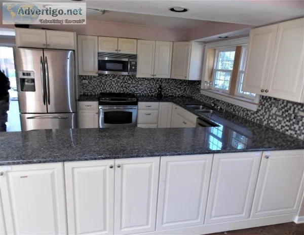 Kitchen Cabinets With Appliances And Granite Counters