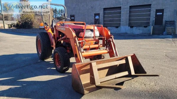 Kubota Tractor with Bucket and Pin on Forks