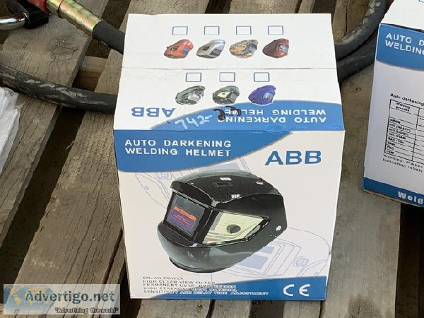 (4) UNUSED AUTO DARKENING WELDING HELMET