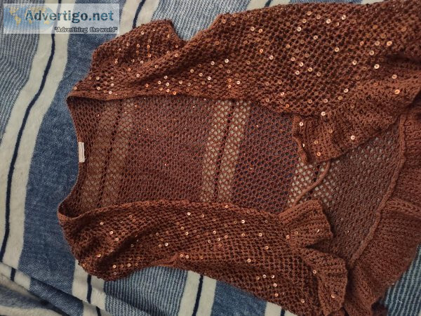 Knitted brown sweater vest with sequins. Size