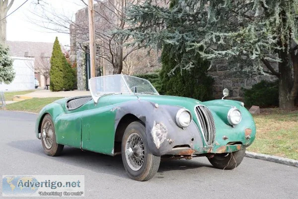24090 1954 Jaguar XK120 Roadster with C-Type