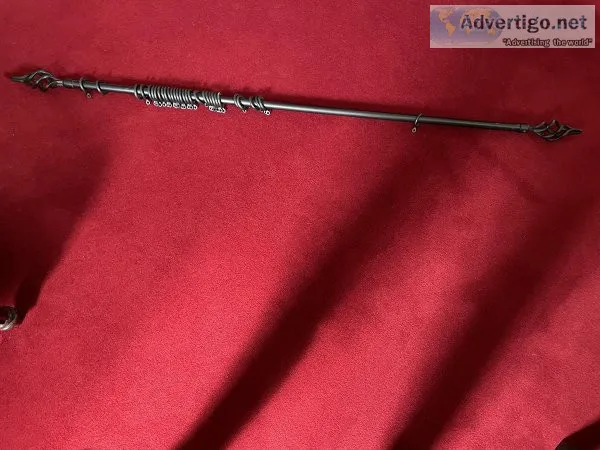 Black metal extending curtain pole