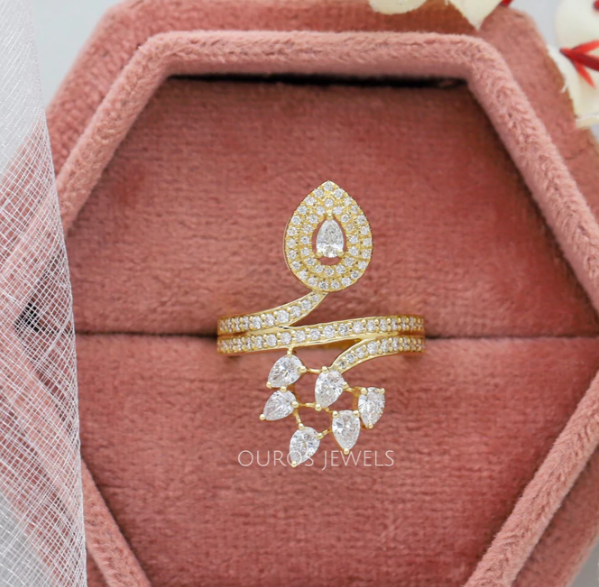 Pear cut diamond bypass ring